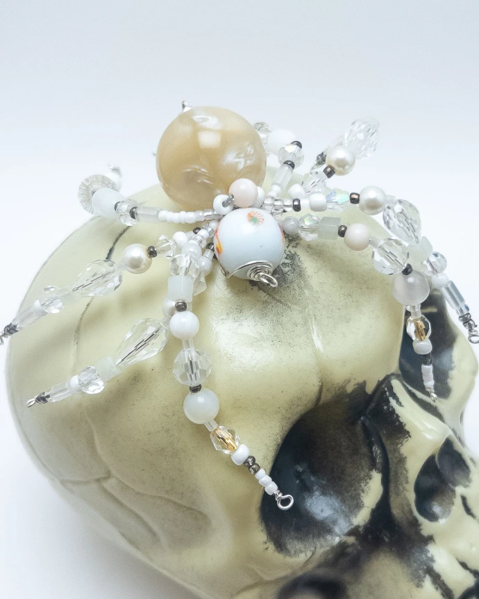 beaded spider on a skull